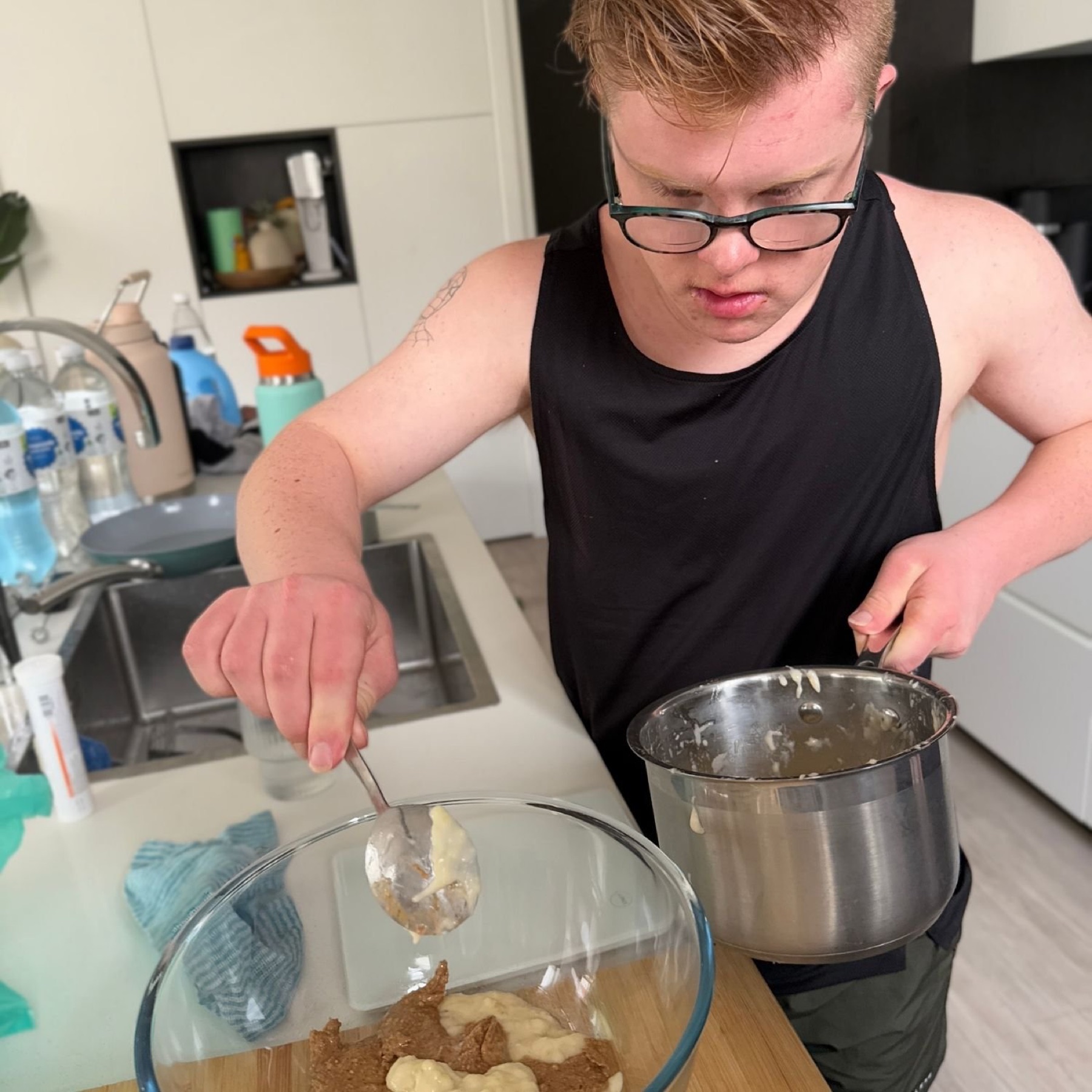NDIS participant baking in the kitchen